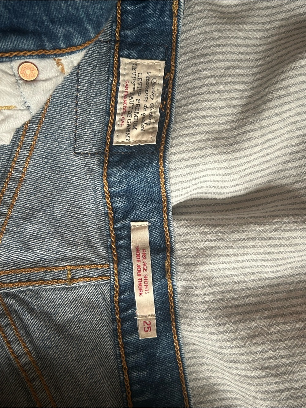 Levi's Medium Blue Denim Cutoff Shorts with Raw Hem - Picture 3 of 3